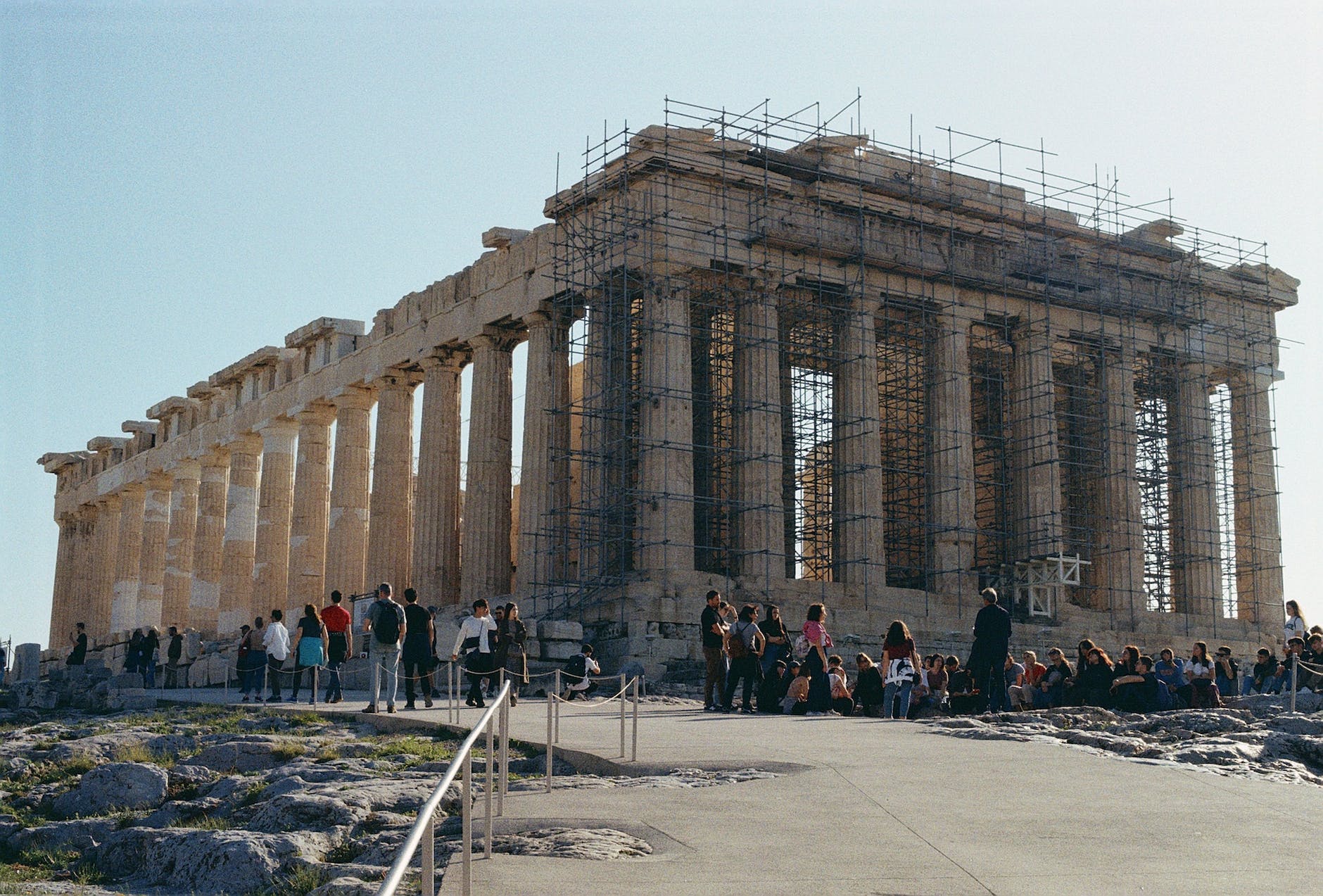 partheon during rennovation with tourists looking at the landmark